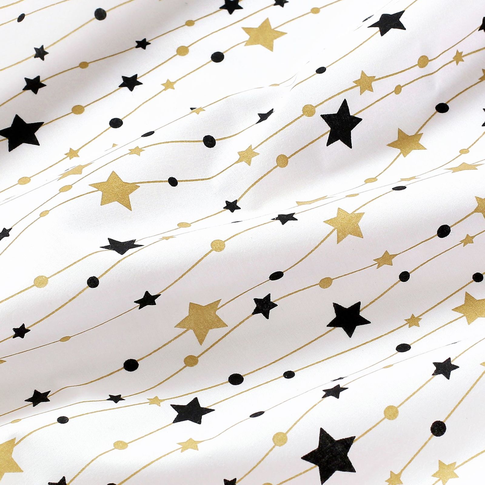 Bavlněné plátno - zlaté a černé hvězdičky na bílém