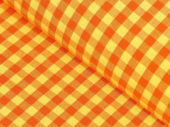 Bavlněná látka - malé oranžovo-žluté kostičky - metráž š. 150 cm
