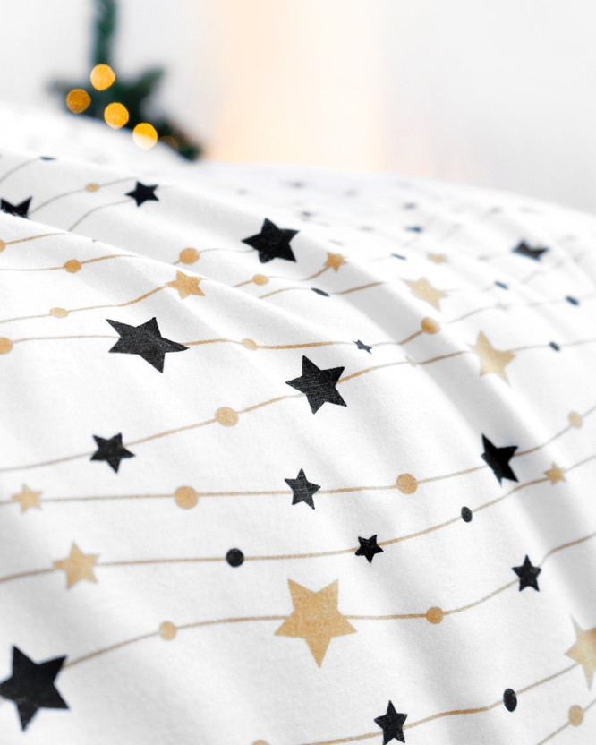 Vánoční flanelové ložní povlečení - zlaté a černé hvězdičky na bílém