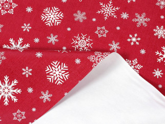 PVC ubrusovina s textilním podkladem - vánoční vzor sněhových vloček na červeném - metráž š. 140 cm