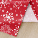 Vánoční bavlněný ubrus - vzor sněhové vločky na červeném - KULATÝ