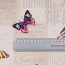 Dekorační závěs LONETA - vzor barevní motýlci
