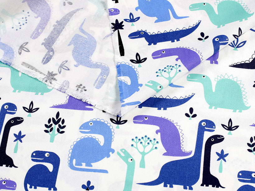Bavlněné plátno - barevní dinosauři na bílém
