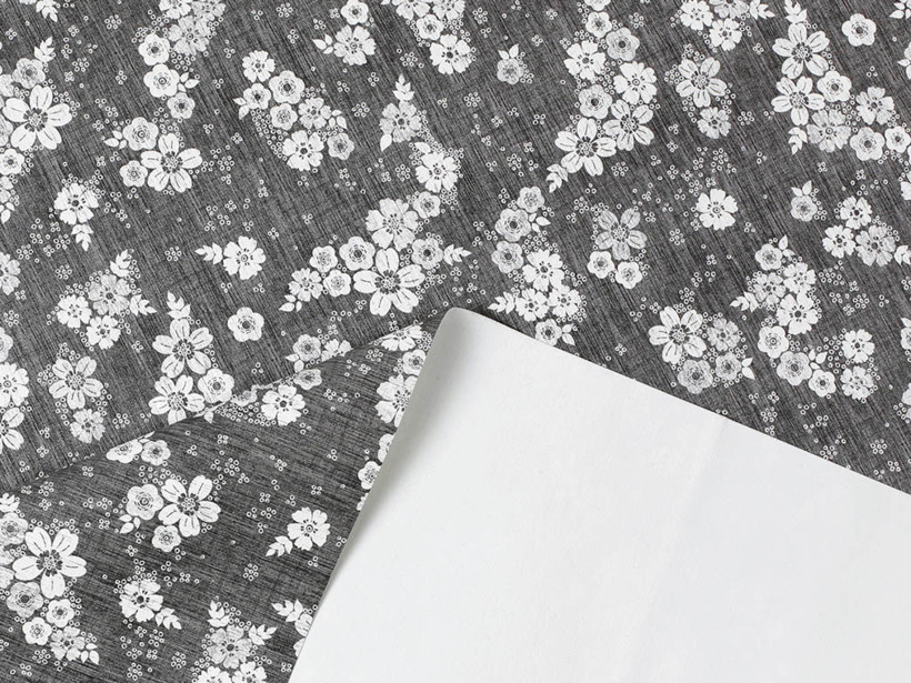 PVC ubrusovina s textilním podkladem - bílé květiny na černém